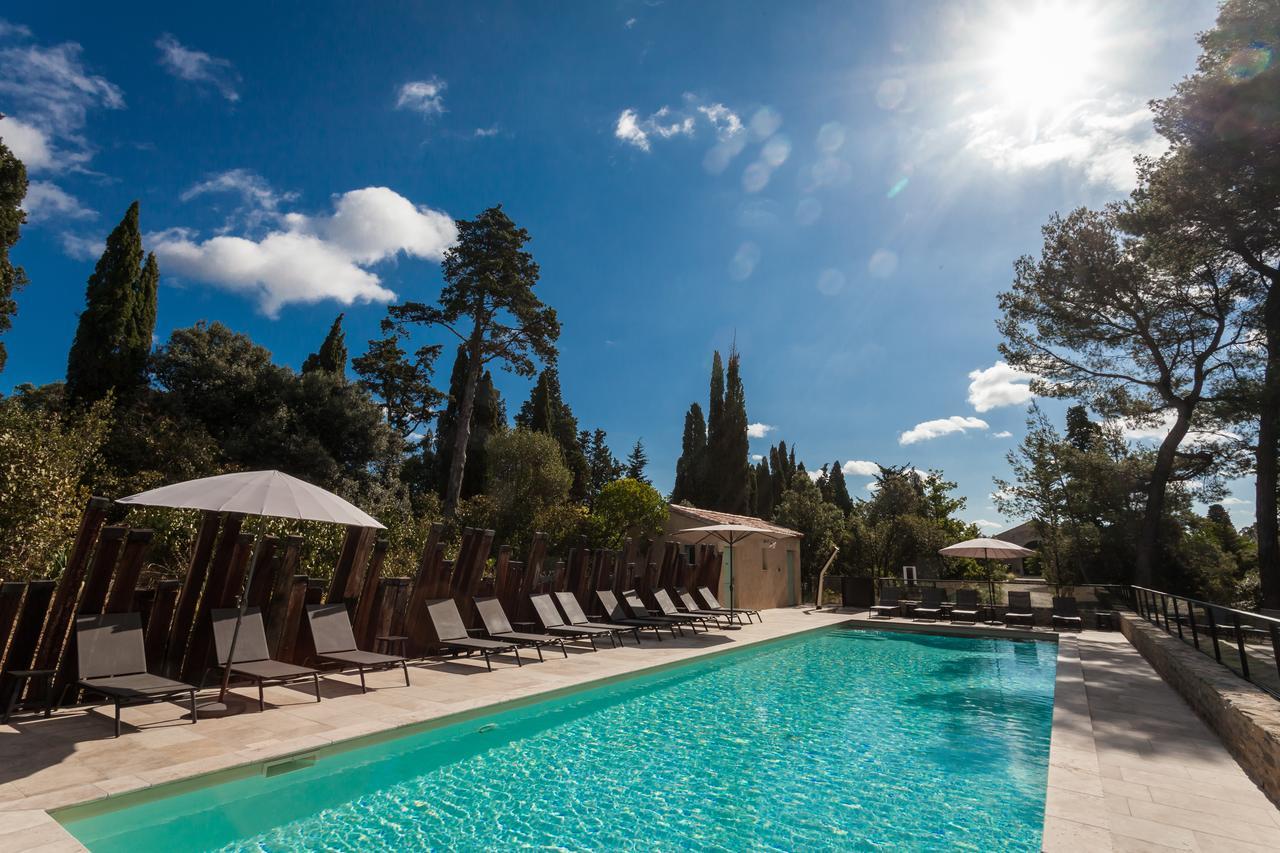 Les Cabanes Dans Les Bois Logis Hotel Villedubert Bagian luar foto