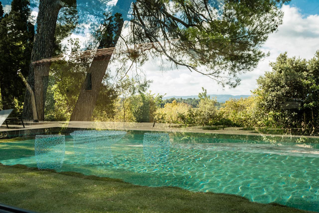 Les Cabanes Dans Les Bois Logis Hotel Villedubert Bagian luar foto