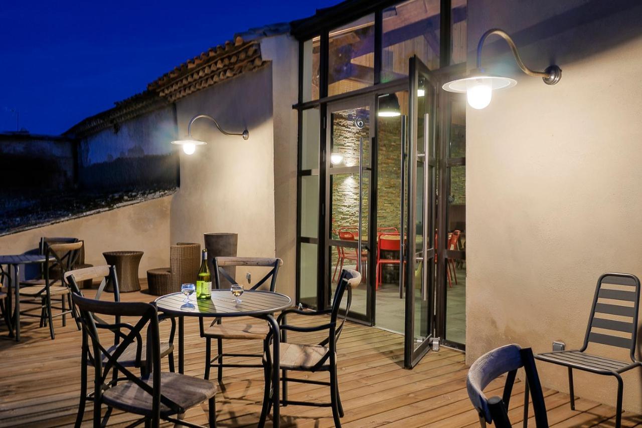 Les Cabanes Dans Les Bois Logis Hotel Villedubert Bagian luar foto